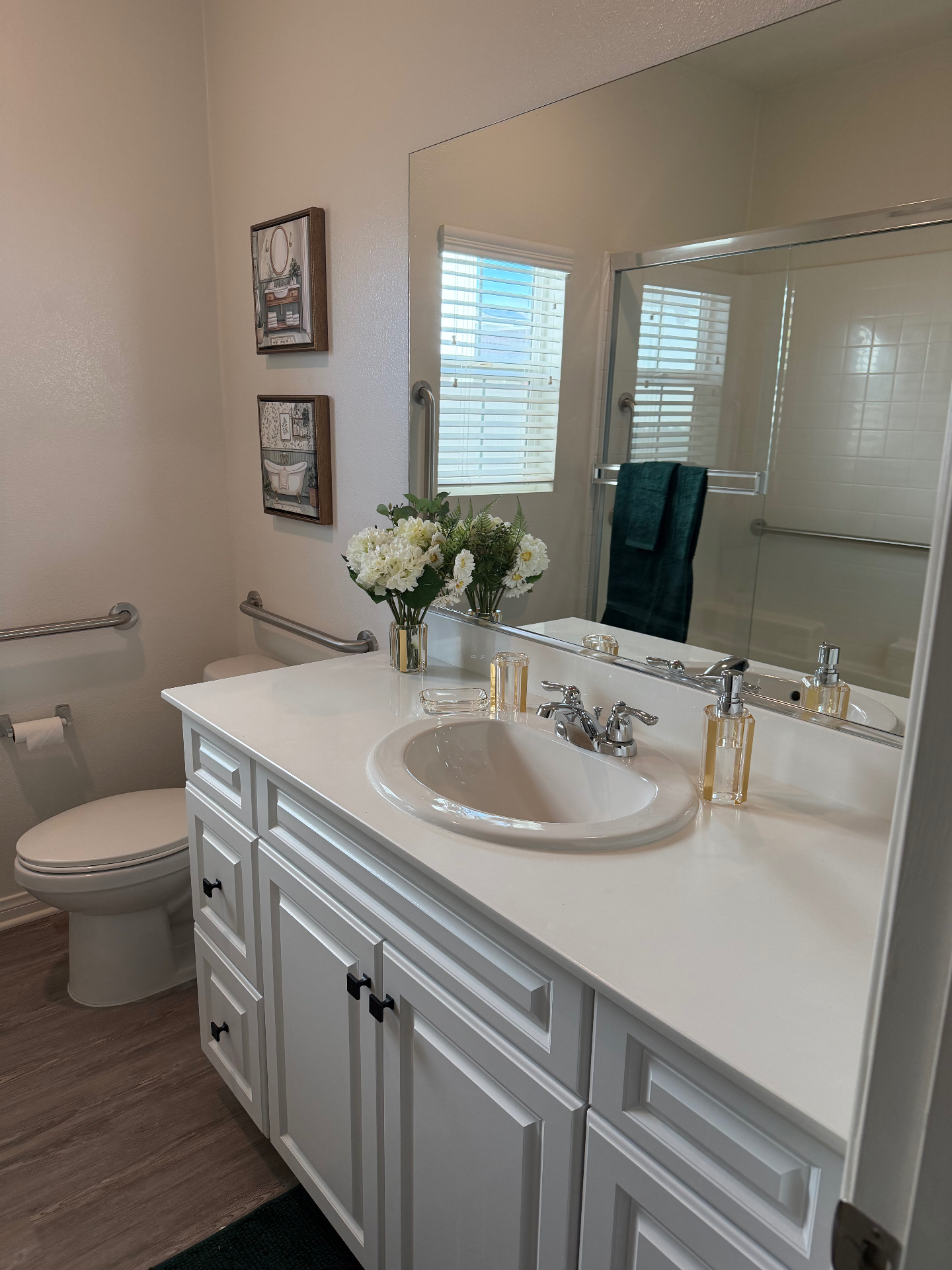 Accessible bathroom with grab bars and walk-in shower